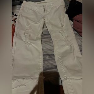 White jeans with holes